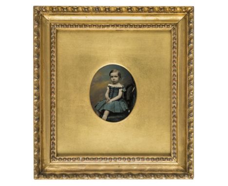 *Sixth-plate ambrotype of a young child, 1850s,  beautifully tinted, 7 x 6cm, gilded wood and plaster frame with printed pape