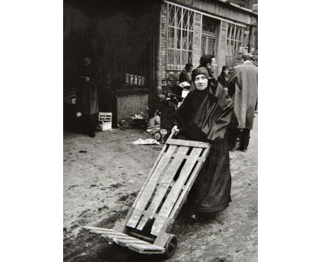 *Ferrer (Marc, 20th century). Les Halles de Paris, 1960s,  a collection of 16 gelatin silver print photographs of the meat ma