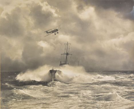 *Buckham (Alfred, FRPS, 1879-1956). Dramatic photograph of a British biplane passing over a Destroyer at sea, 1918,  large ge