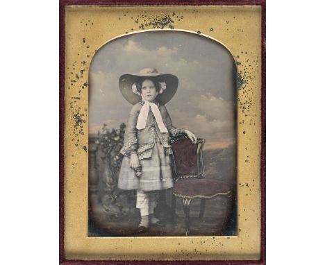 *Pair of quarter-plate tinted daguerreotypes, by William Edward Kilburn, both 1852-1855,  the first of a young girl standing 