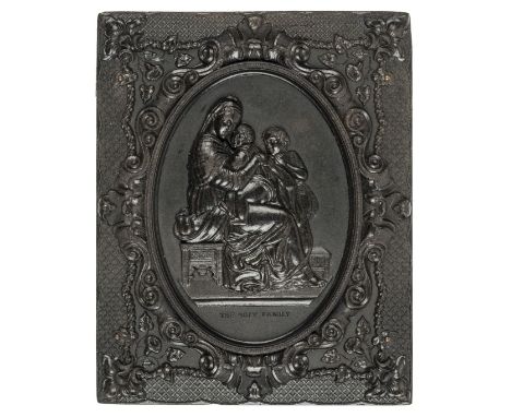 *The Holy Family. Very rare half-plate brown thermoplastic union case by Holmes, Booth & Haydens, c. 1860,  housing an albume