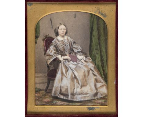 *Liverpool Institute of Photography. A beautifully tinted albumen print portrait of a seated young lady in ornate satin dress