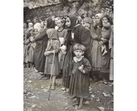 *Seymour (David, 'Chim', 1911-1956). Orphans of the Greek War, 1948,  vintage gelatin silver print of an elderly woman with c