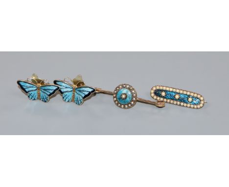 A pair of Norwegian 925 and enamel butterfly ear clips and two yellow metal and seed pearl set brooches.
