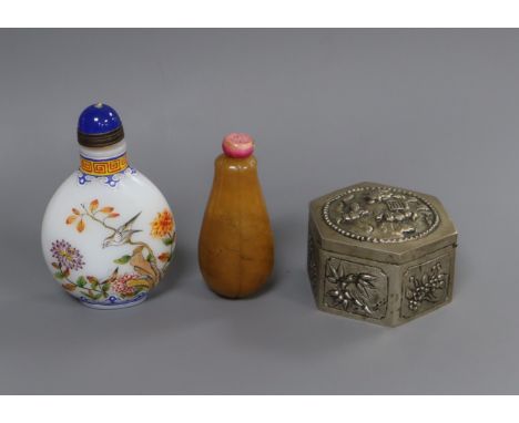 Two Chinese glass snuff bottles and a hexagonal metal box and cover