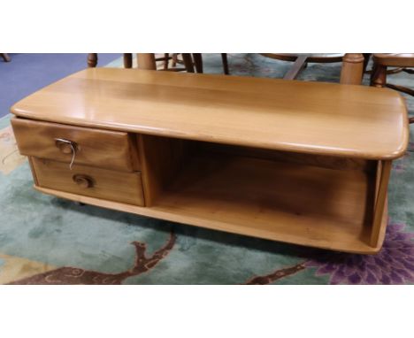 An Ercol light elm TV stand or coffee table W.125cm