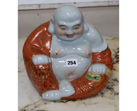 A Chinese ceramic buddha
