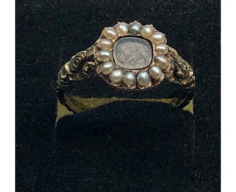 18th 19th century gold and seed-pearl mourning ring with central hair locket with seed-pearls around some repairs to shank 