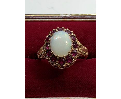 9ct gold opal and ruby dress ring weight 4.5g