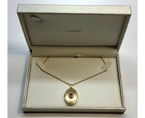 9ct gold locket and chain set with amethyst total weight 6.8g
