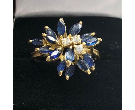 18ct gold diamond and sapphire ring not hallmarked but has been acid tested as at least 18ct gold weight 6g