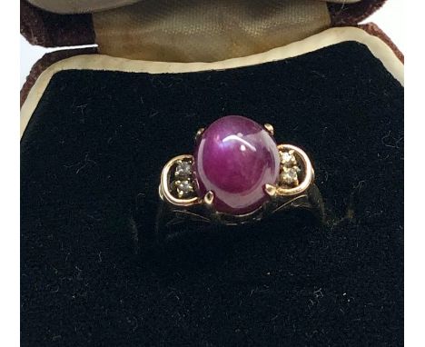 14ct gold and diamond stone set ring possibly ruby weight 3.6g