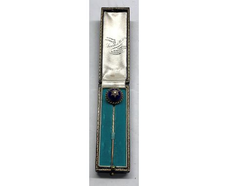 Antique diamond stick pin set with central diamonds set in blue enamel head in high carat gold not hallmarked head measures a