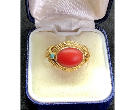 18ct gold coral ring set with central coral stone measures approx 12mm by 9mm with small turquoise stone on side missing one 