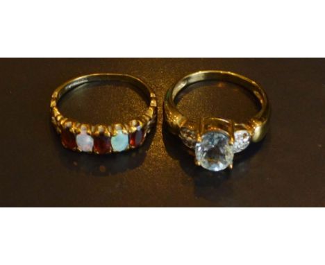 A 9 Carat Gold, Opal and Amethyst Set Band Ring, together with another 9 carat gold dress ring 