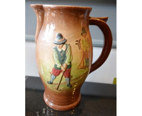A Royal Doulton commemorative Golfing Jug decorated in relief with a golfer and caddy, 24cm tall 