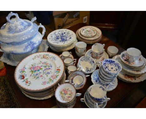 A Coalport Part Tea and Dinner Service, together with another similar by Coalport, and English tea service and an underglazed