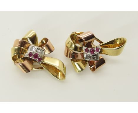 A pair of 14ct gold ruby and diamond ear clips in a two colour gold bow design, dimensions 2.7cm xx 1.8cm, weight approx 9.5g