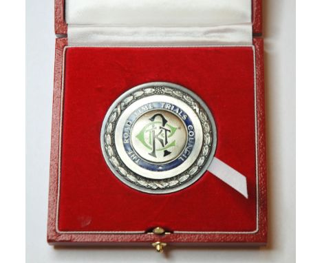 A white-metal (silver) and enamel medal, the obverse inscribed The Road Time Trials Council the reverse lettered Men's 25 Mil