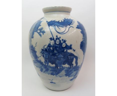 A Chinese blue and white baluster vase painted with warriors on horseback carrying flags beneath clouds and amongst rock work