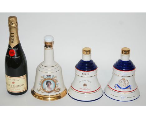 A bottle of Moet & Chandon Champagne 75cl, 12% vol in carton and three Bells decanters