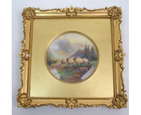 A framed Royal Worcester plaque by Harry Davis hand painted with sheep in a mountainous landscape, signed H Davis, puce mark 