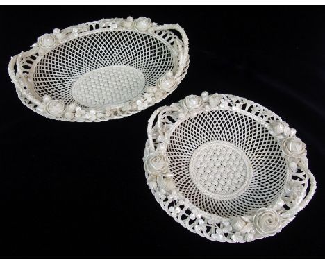 A large Belleek First period 'Sydenham Twig' floral decorated oval basket with three strand basket weave base with pearl fini