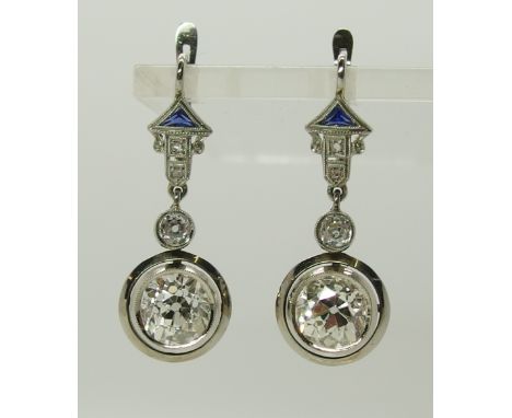 A pair of substantial Art Deco Chinese influence Earrings the diamond drops are estimated approx 1.50cts each, suspended from