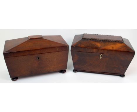 A Victorian mahogany sarcophagus-shaped two division tea caddy with mixing bowl, with knob handles on turned bun feet, 32cm w