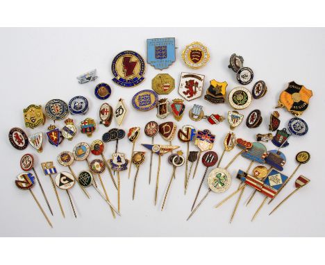 A collection of football enamel lapel badges including English and Scottish League, European examples etc