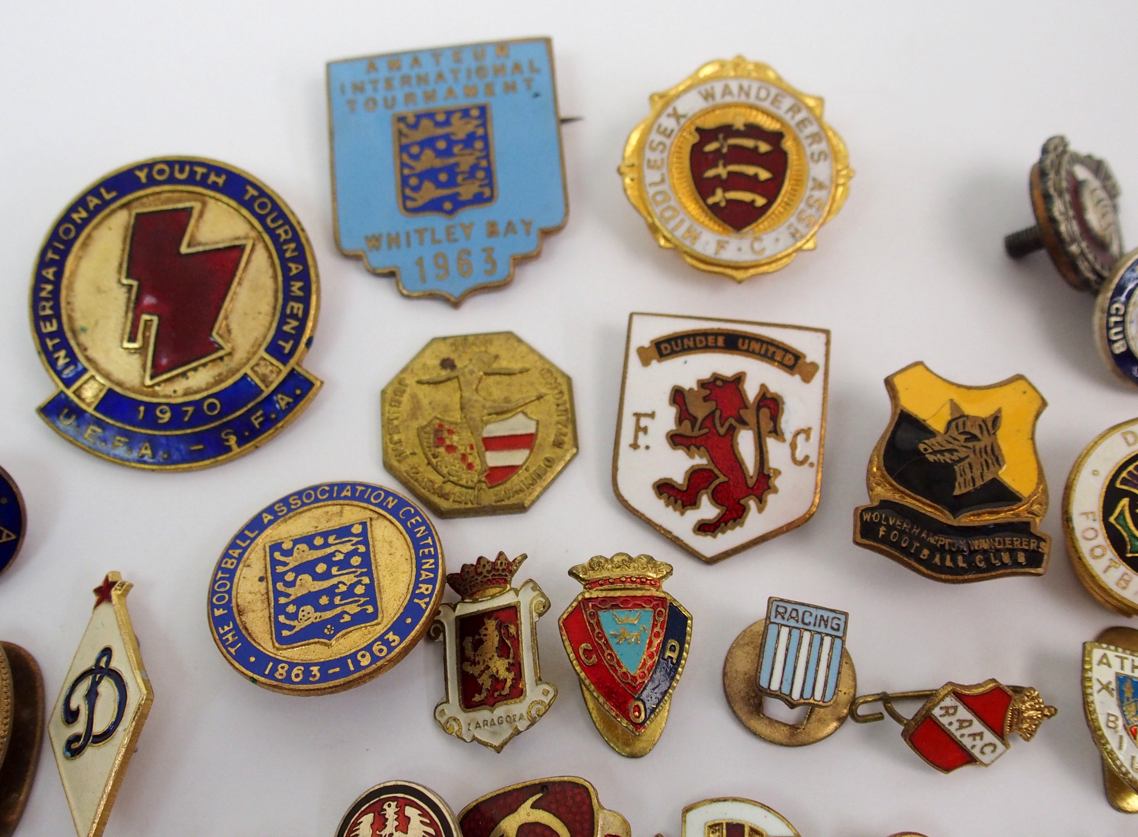 A collection of football enamel lapel badges including English and ...