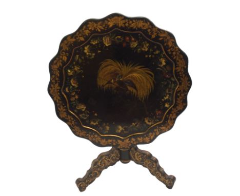 An ebonised tripod table painted with a bird of paradise within a border of flowers and foliage on scrolling legs, 82cm diame