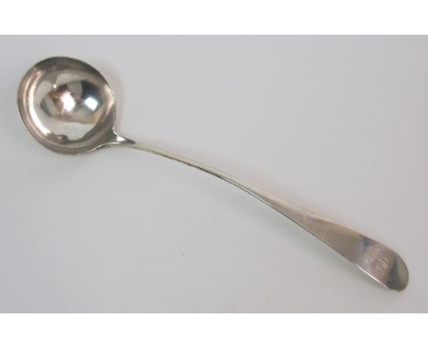 A George III silver ladle makers mark TS, Edinburgh 1795, approximately 5oz, 35cm long