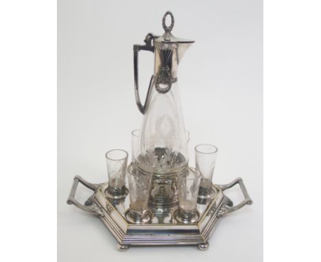 An Art Nouveau WMF EPNS  jugendstil liqueur set on hexagonal two-handled tray, comprising mounted decanter and six glasses, o