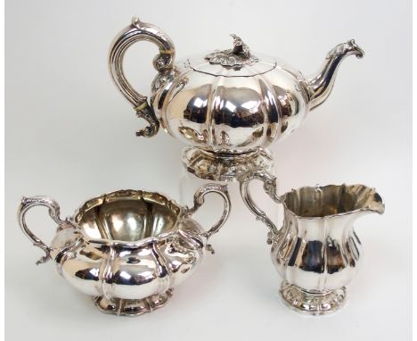 A William IV three piece silver tea service by William Marshall, Edinburgh 1836 (the cream jug 1832), of squat circular shape