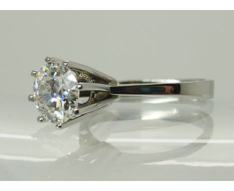 An 18ct white gold diamond solitaire in a high prong setting diamond estimated approx at 1.40cts, finger size K, approx weigh