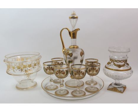 A Continental Art Nouveau glass drinks set on tray the decanter jug with painted stylised floral decoration with burnished gi