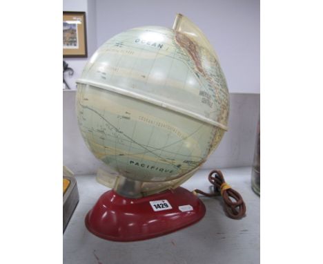 A Mid XX Century Original Light-Up World Globe, on a tinplate base. 