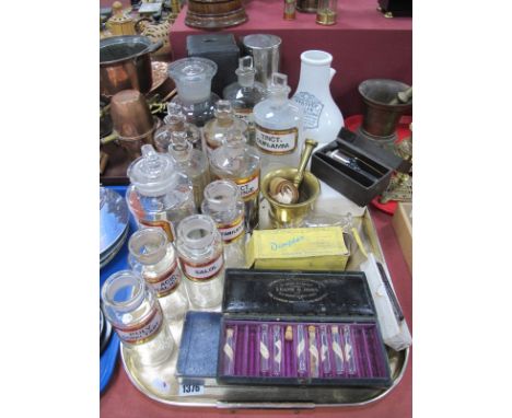 A Quantity of Early XX Century Chemist's Bottles, with enamel labels, an Improved Inhaler, a brass pestle and mortar, plus ot