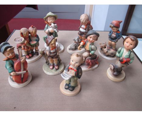 Nine Larger Hummel Figures, some earlier backstamps; a similar figure:- One Tray