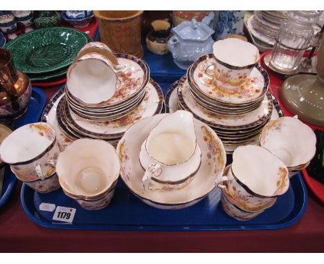 Royal Albert Crown China, early XX Century floral tea service of thirty nine pieces, with blue and gilt bands.