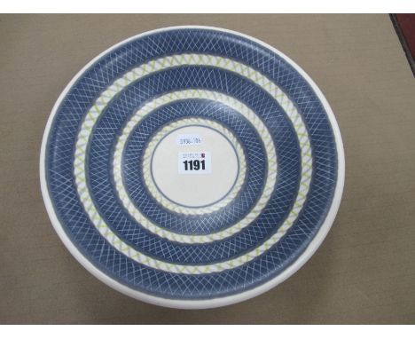 A c.1950's Poole Pottery Freeform Dish, shape 291, faint stamped mark and "E/PKC D", decorated with crosshatched bands, plain