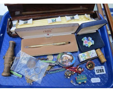 Corkscrews, eternity ring, mother of pearl and nacre knife rests, Brodsworth miners badge, etc:- One Tray.