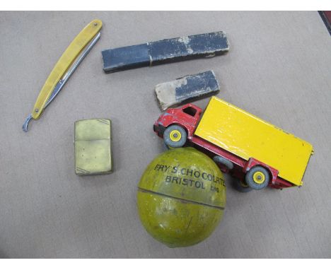 Dinky Big Bedford Lorry, Zippo lighter, Razor, Fry's Chocolate Bristol Tinplate Lemon, 8.5cm high.