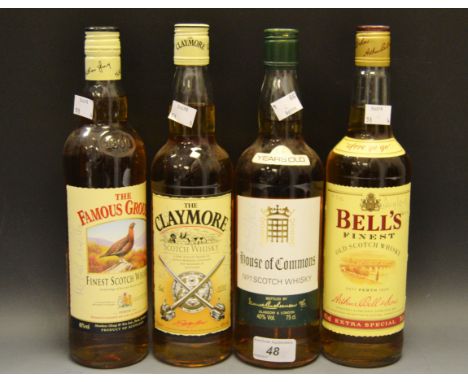 Parliamentary Interest - a Bells Scotch whisky bottle signed Douglas Hurd; another, a Claymore whisky bottle signed Michael P