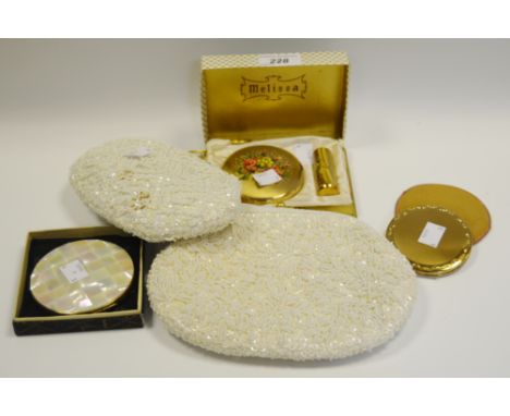 Ladies Ephemera - a Melissa boxed compact and lipstick holder; a Stratton mother of pearl compact, boxed; another; a Lady's b