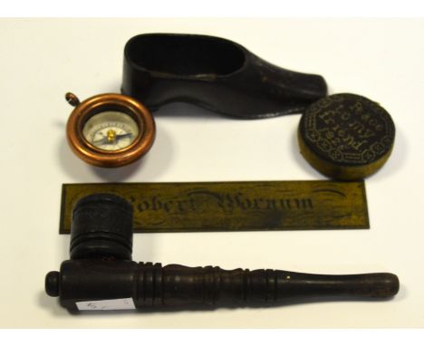A 19th century papier mache snuff box in the form of a shoe; an early 19th century pin cushion embroidered Peace to my Friend
