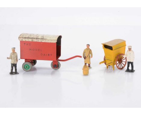 Unusual hand-drawn carts by Taylor & Barrett and Charbens comprising post WW2 T & B lead bakers cart with baker and basket, C