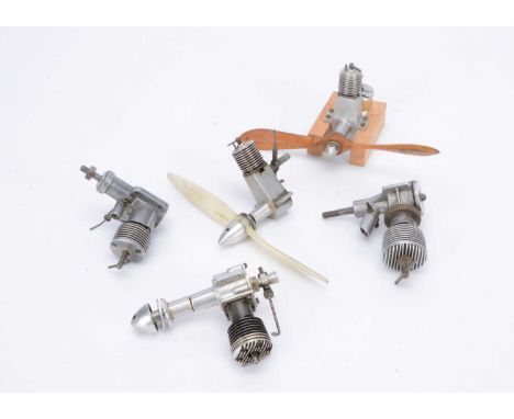 Five Diesel Aero Engines by 'K' and others, one with 'K' cast into crank-case, two smaller engines with long cast-alloy crank