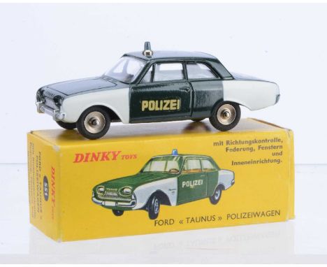 A Rare French Dinky Toys 551 Ford Taunus 17M Police Car, made for export to Germany and Benelux countries, dark green body wi